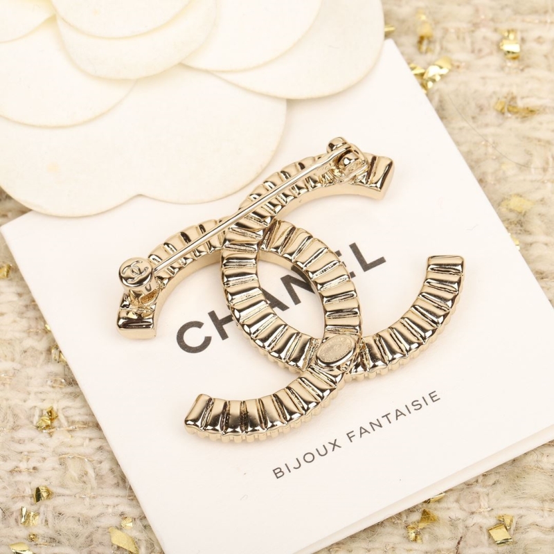 Ch**el brooches